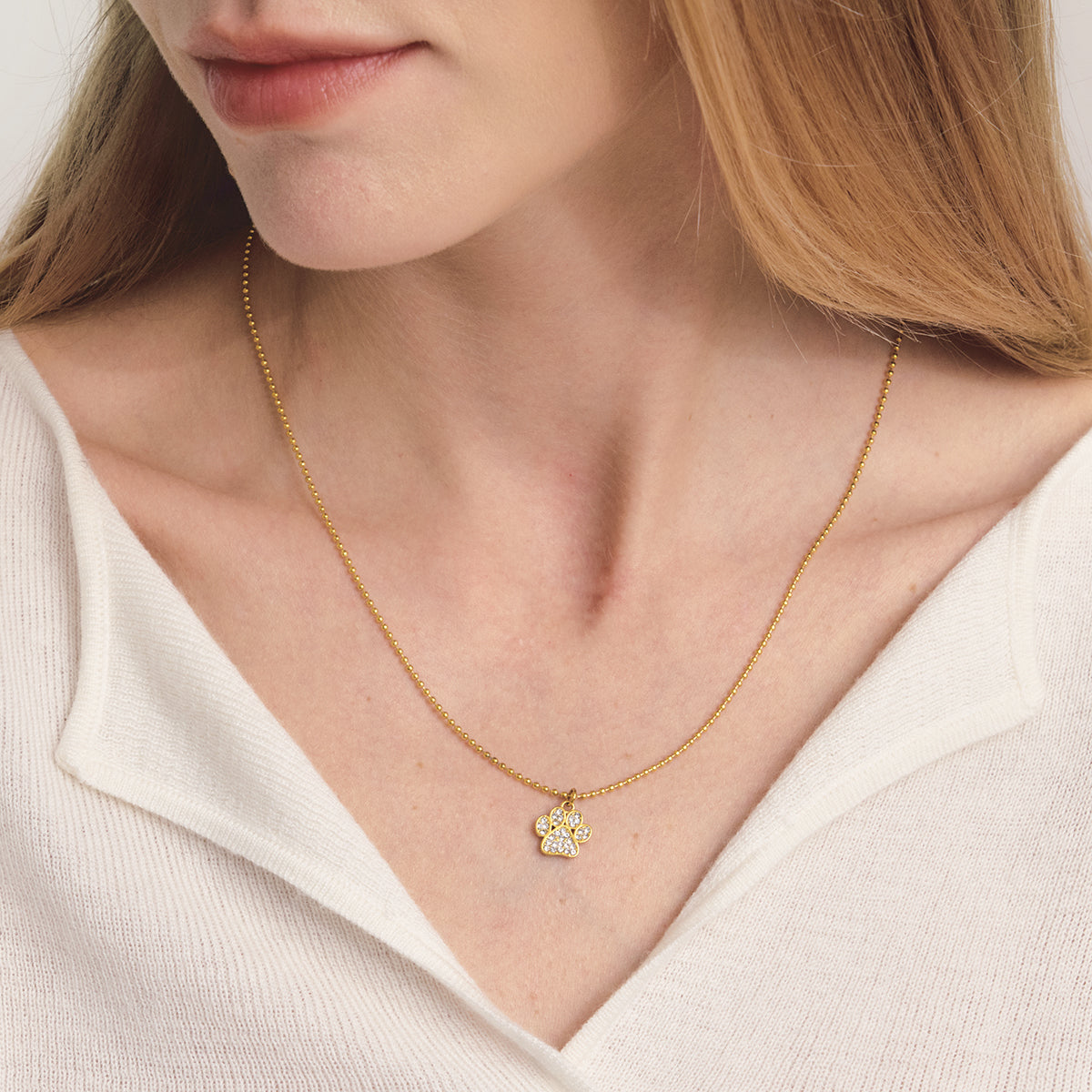 Paw Necklace:  18k PVD plated necklace