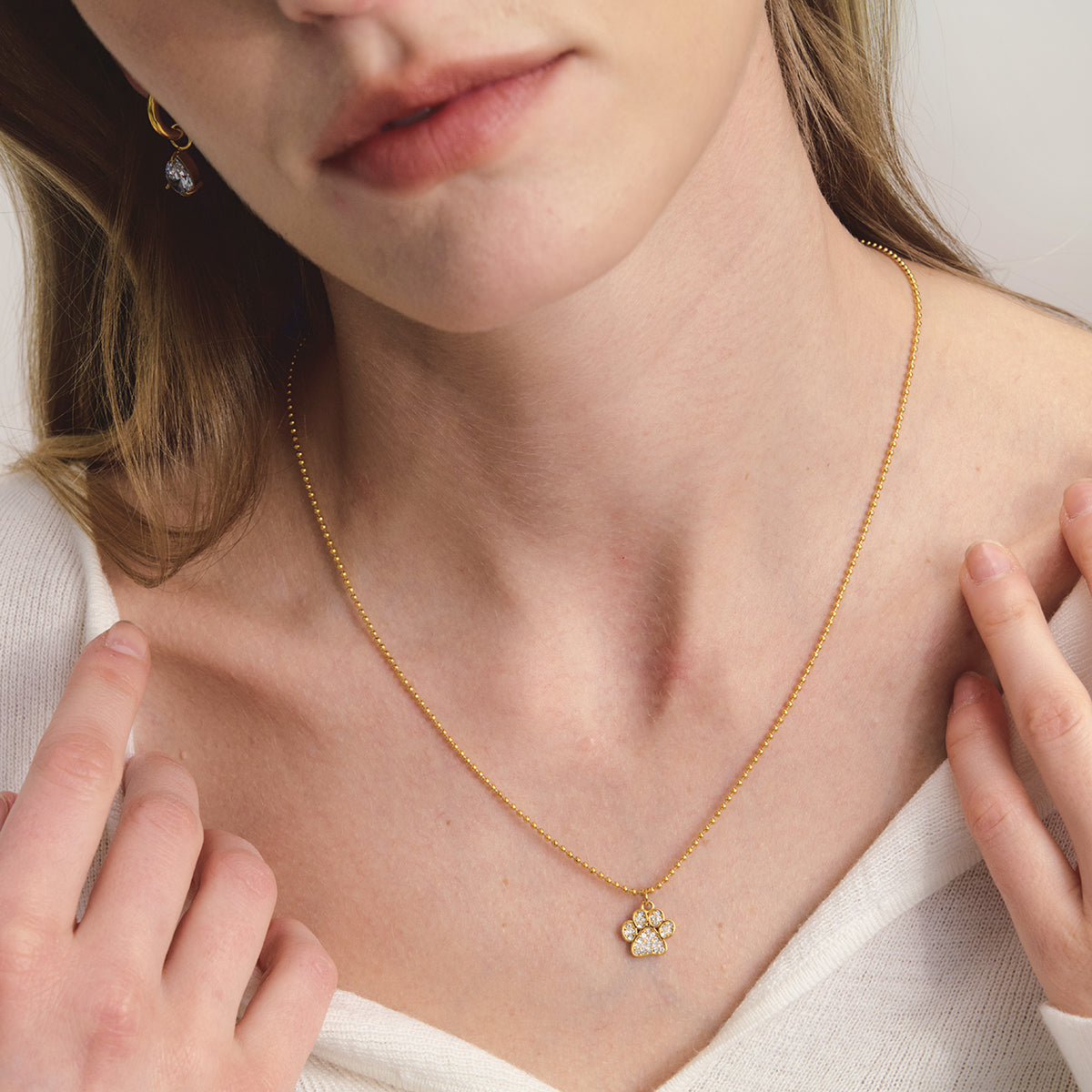 Paw Necklace:  18k PVD plated necklace